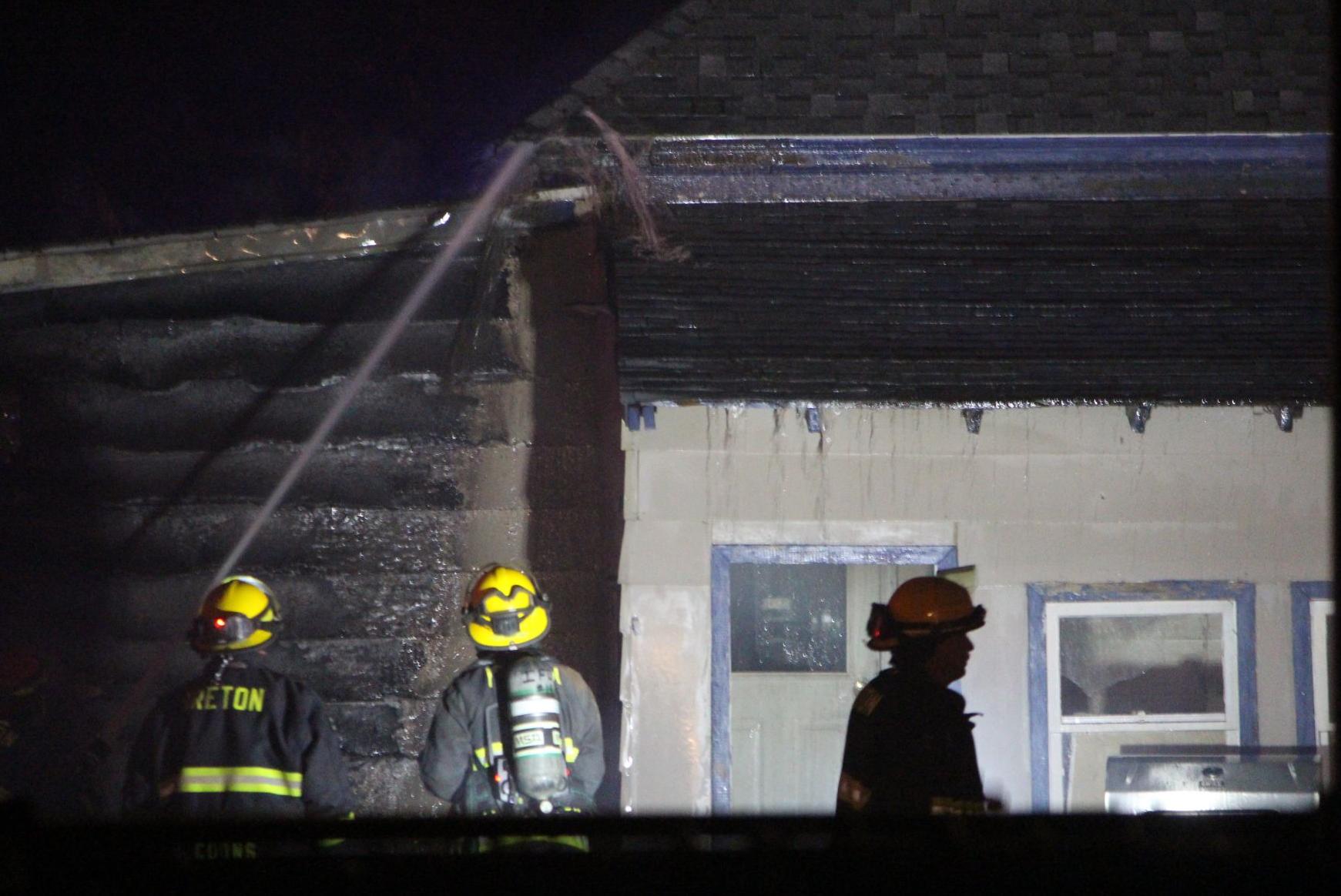 Fire spreads from garage to house